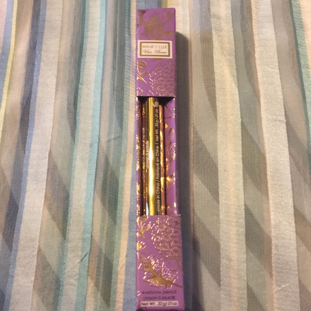 Winky Lux Uni-Brow